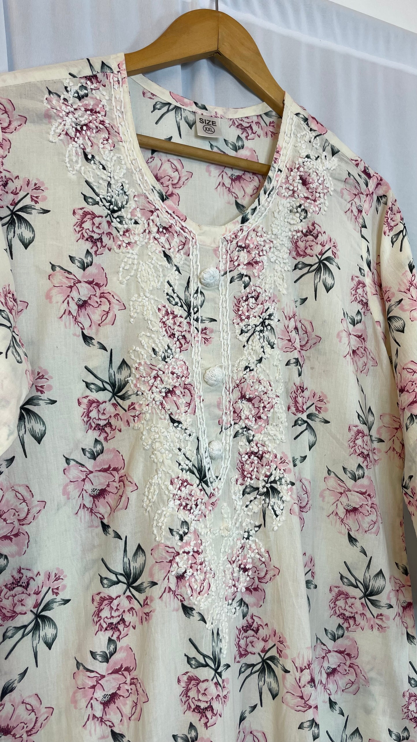 Floral printed cotton embroidered kurti .